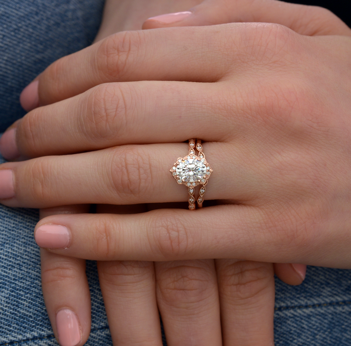 oval halo vintage look rose gold with band in a hand