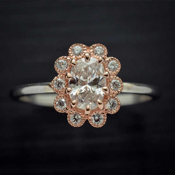 oval natural diamond flower halo two tone ring