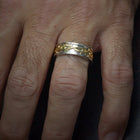 men wedding band two tone crown of thorns yellow and white gold on a finger