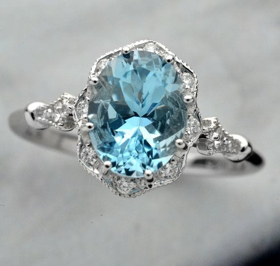 Aqua Marine oval halo engagement ring vintage inspired