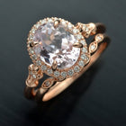 Oval pink Morganite engagement ring halo in rose gold vintage inspired
