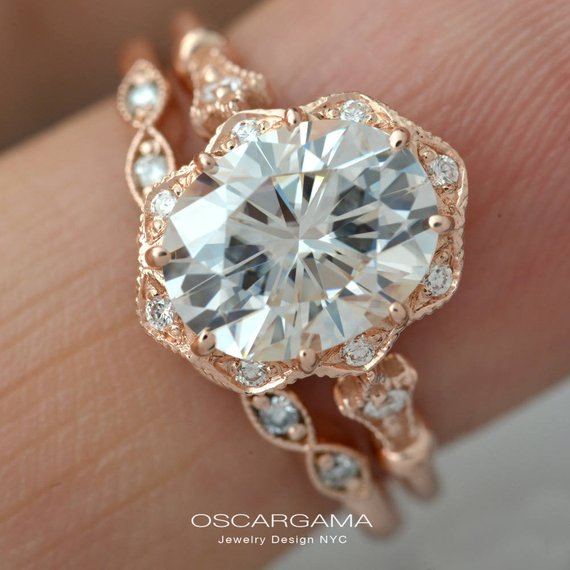 rose gold oval halo engagement ring with band