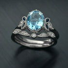 Ovaloval  blue aqua marine engagement ring and band