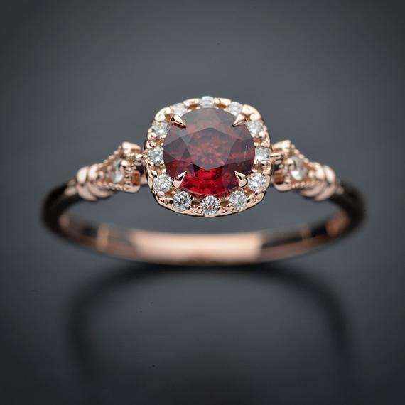 rose gold cushion halo engagement ring red garnet red center