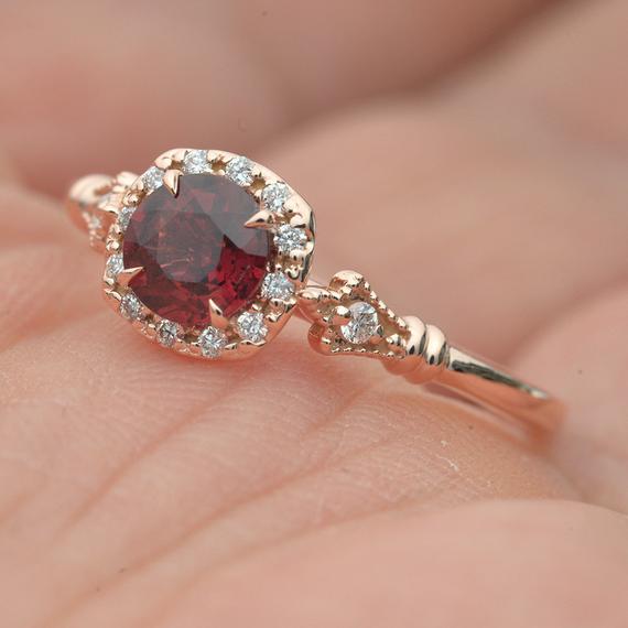 yellow gold cushion halo engagement ring red garnet red center