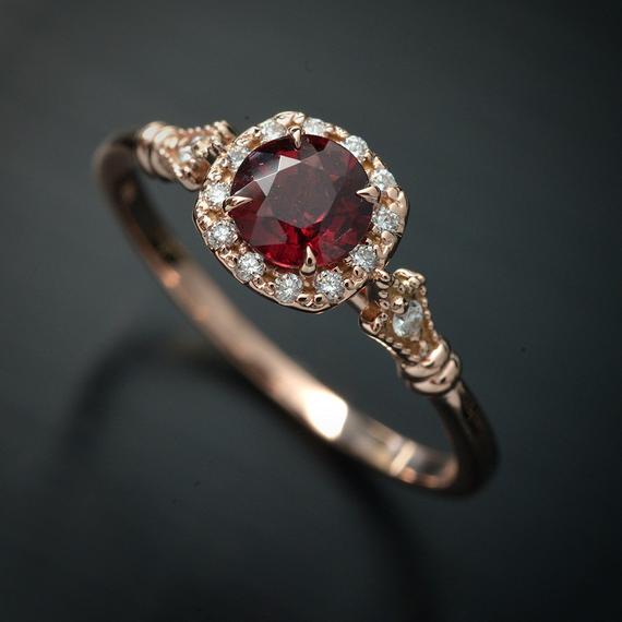 rose gold cushion halo engagement ring red garnet red center