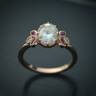 Oval engagement ring with marquise rubies in rose gold vintage inspired