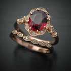 red garnet oval halo rose gold engagement ring set