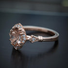 oval halo engagement ring vintage inspired with a morganite in rose gold side view