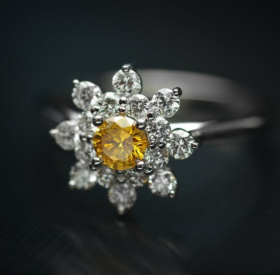 Fancy Intense Orange Yellow Cluster Ring in white gold