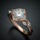 Rose gold engagement ring vintage inspired halo with a vine twist band