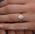 Engagement ring oval halo vintage look rose gold in a hand